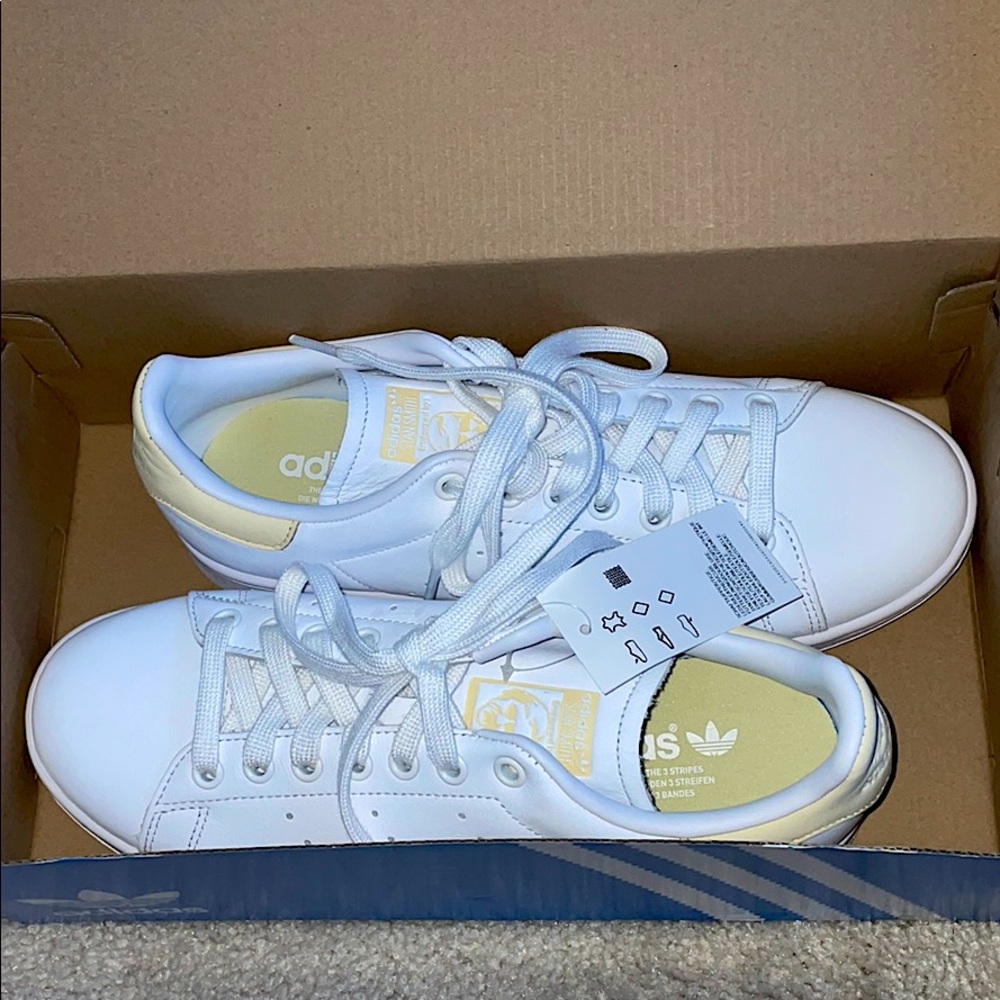soft yellow Stan smith originals. NEVER WORN